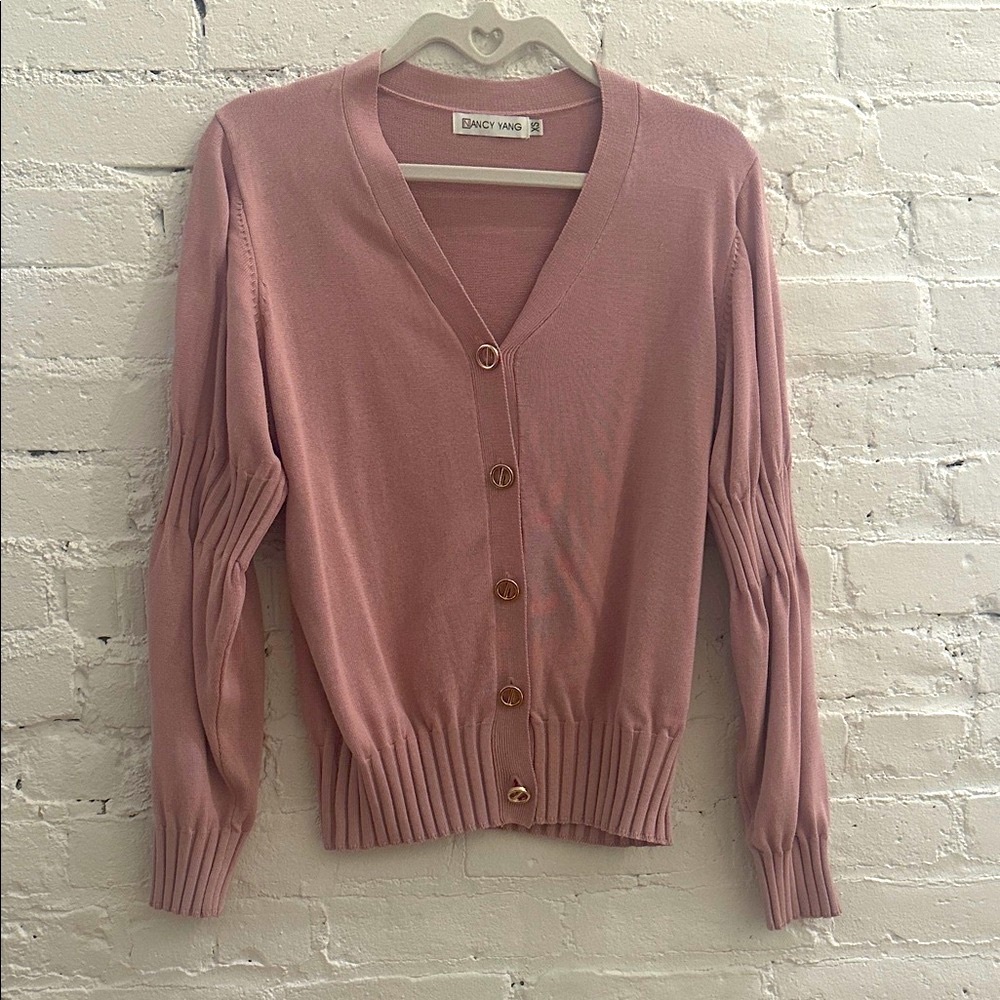 Nancy Yang blush pink sweater with gold buttons